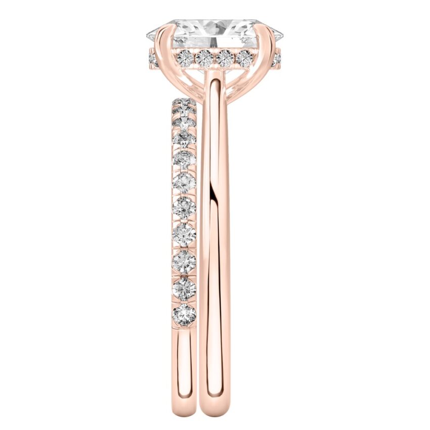 Side view of oval cut diamond pave bridge engagement ring set rose gold