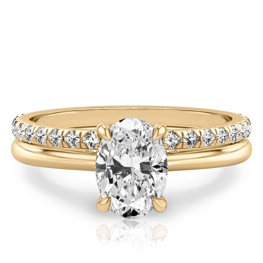 oval cut diamond pave bridge engagement ring set yellow gold