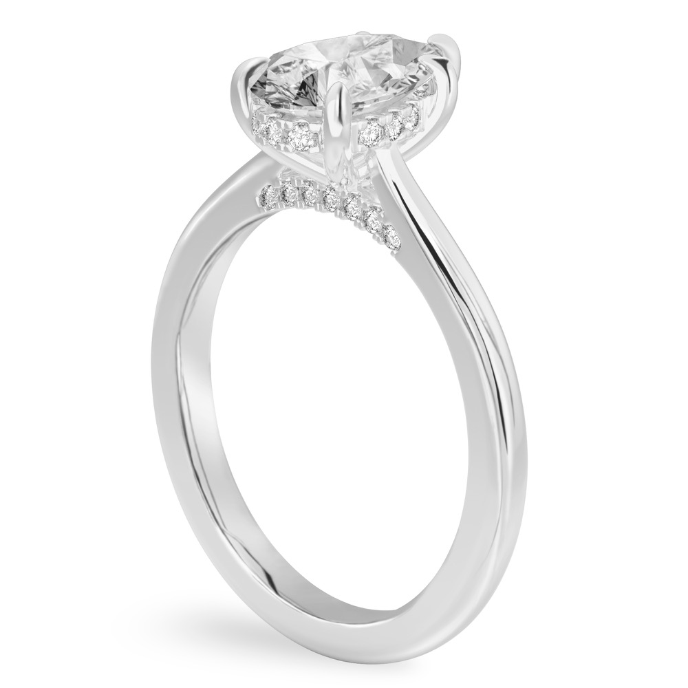 Angle view of pear shape diamond pave bridge engagement ring in platinum