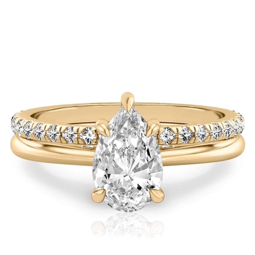pear shape diamond pave bridge engagement ring set yellow gold