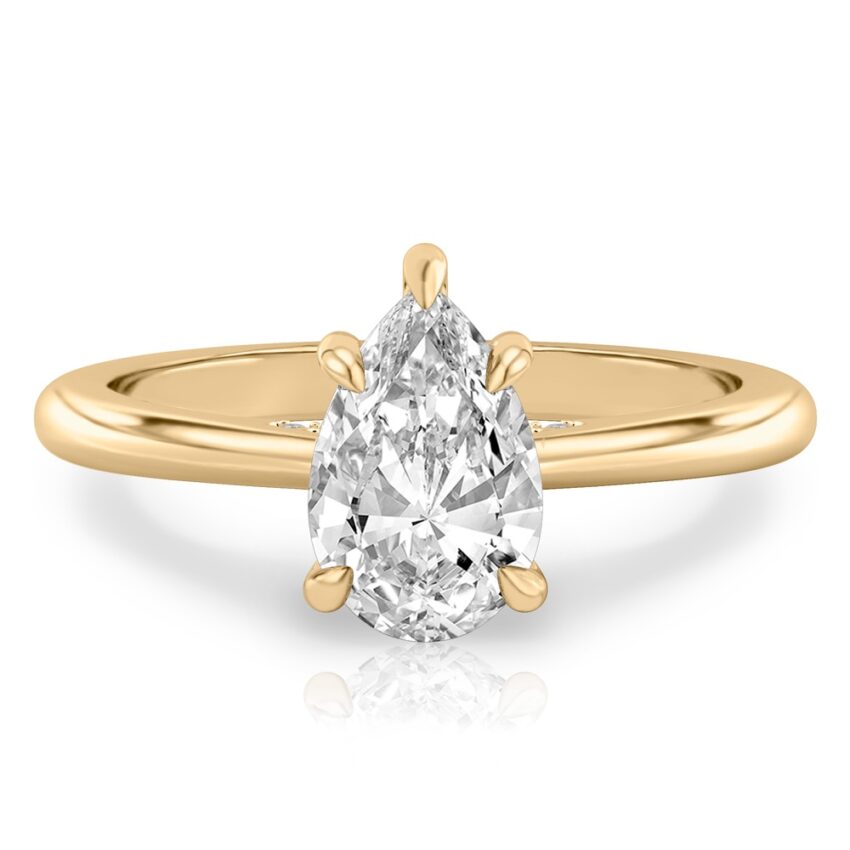 pear shape diamond pave bridge engagement ring in yellow gold