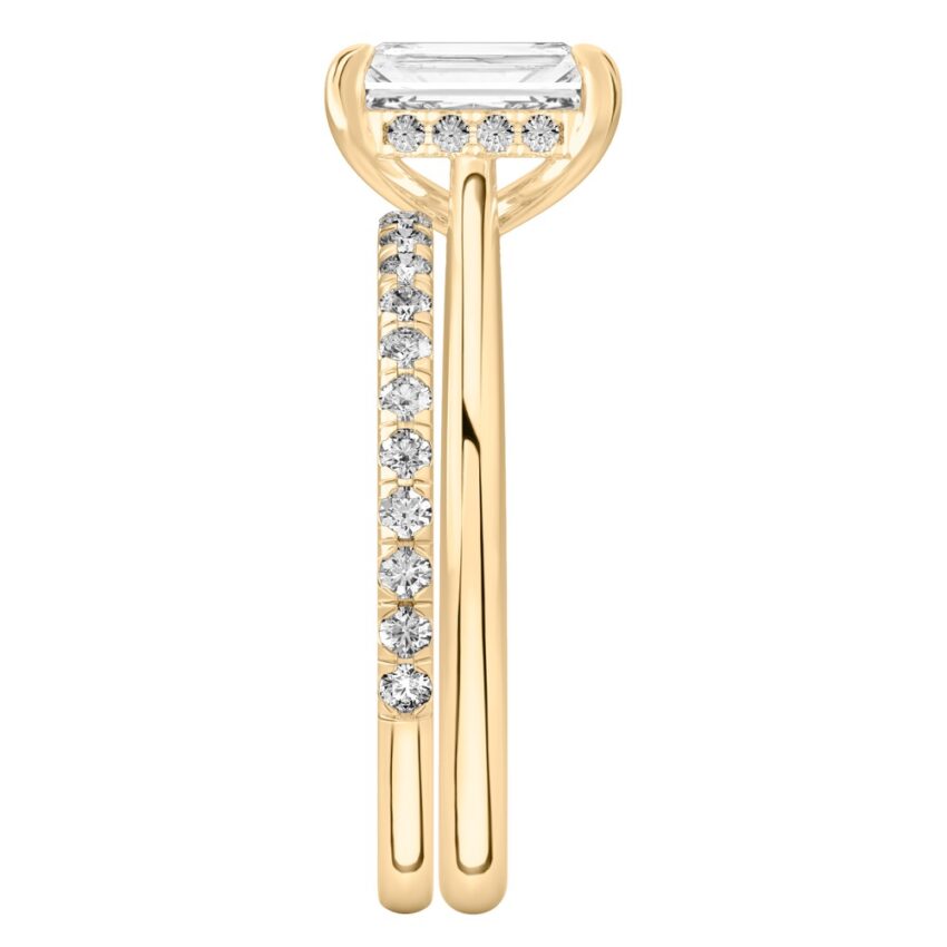 Side view of radiant cut diamond pave bridge engagement ring set yellow gold