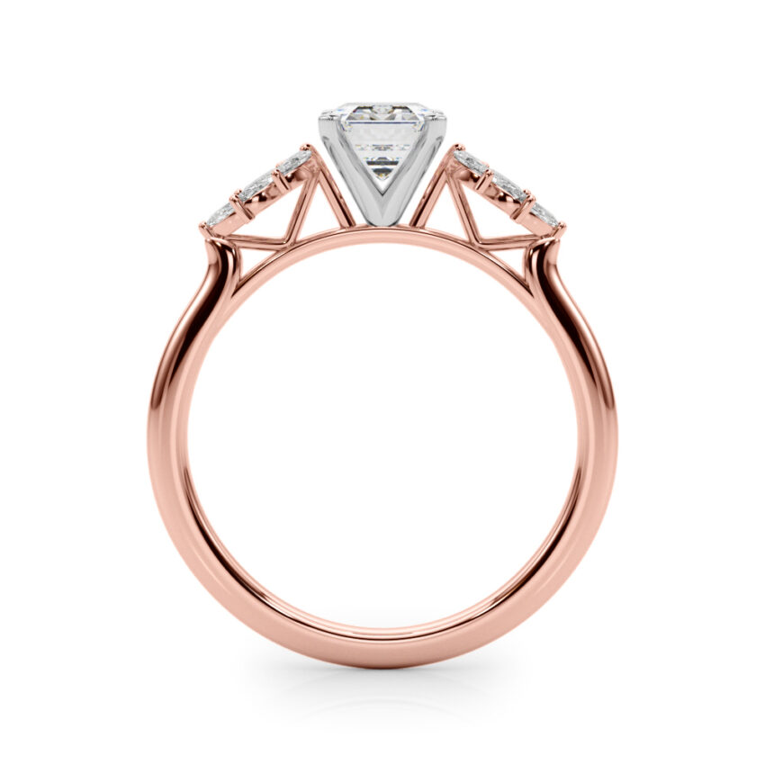 Side view of emerald cut diamond nature inspired marquise stone engagement ring in rose gold
