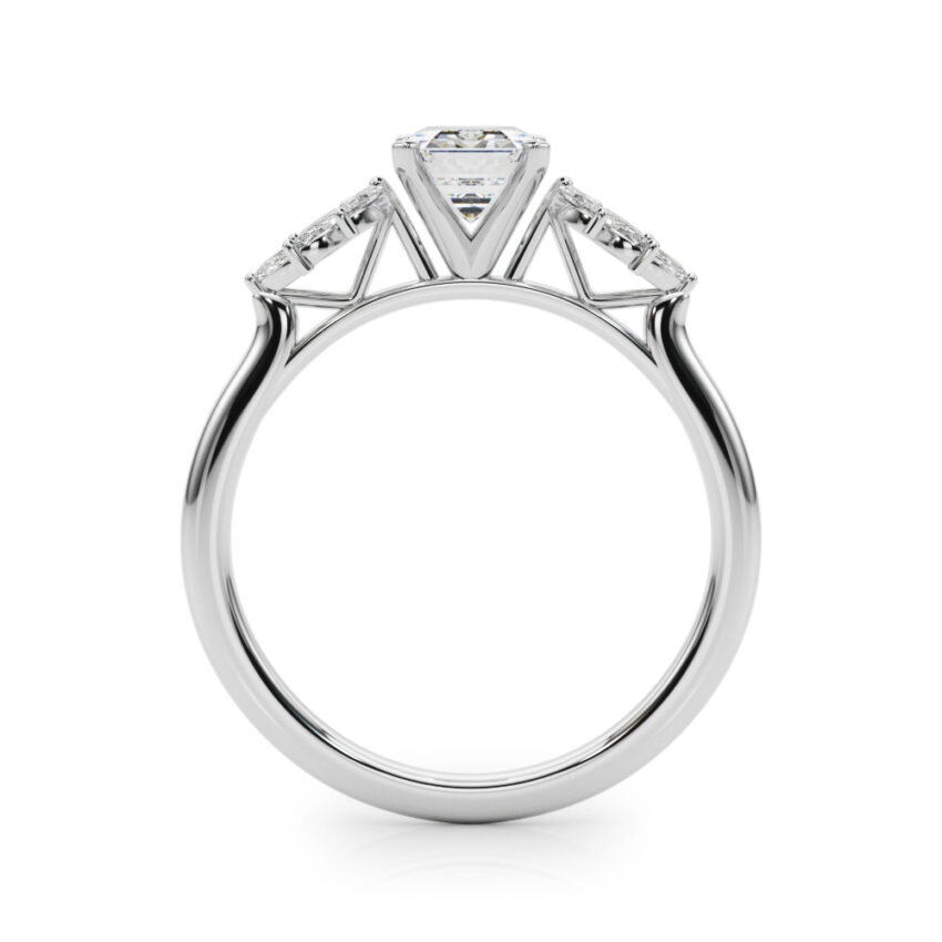 Side view of emerald cut diamond nature inspired marquise stone engagement ring in white gold