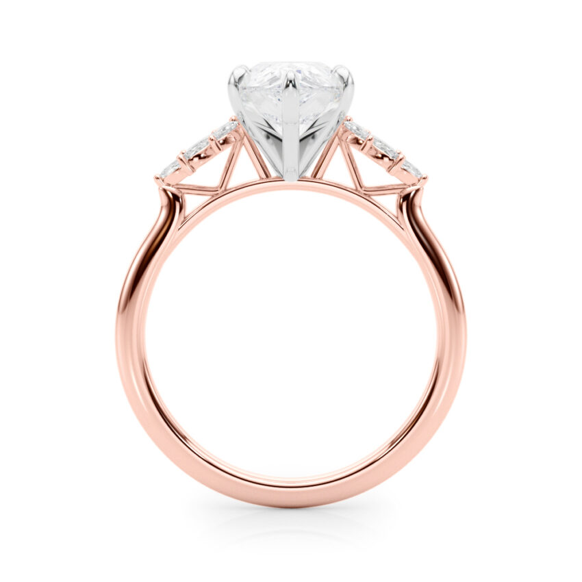 Side view of pear shape diamond nature inspired marquise stone engagement ring in rose gold
