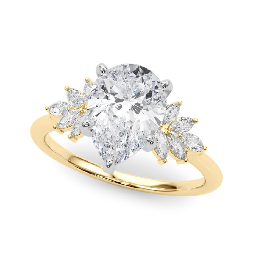 Angle view of Side view of pear shape diamond nature inspired marquise stone engagement ring in yellow gold