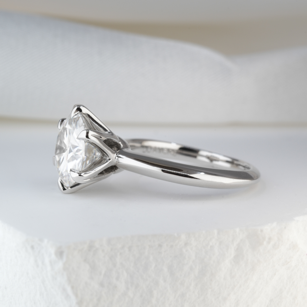 2.20 Carat Round Cut Moissanite Six Claw Prong Engagement Ring Platinum Lifestyle Side