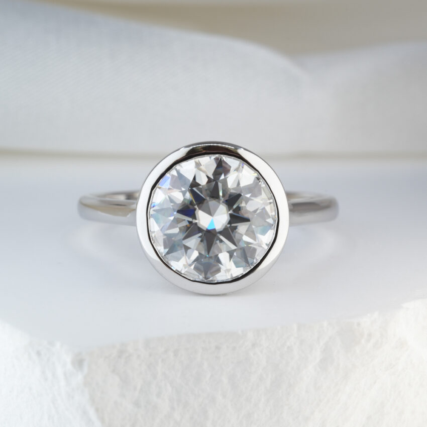 3.10 Carat Round Cut Moissanite Bezel Engagement Ring White Gold Lifestyle