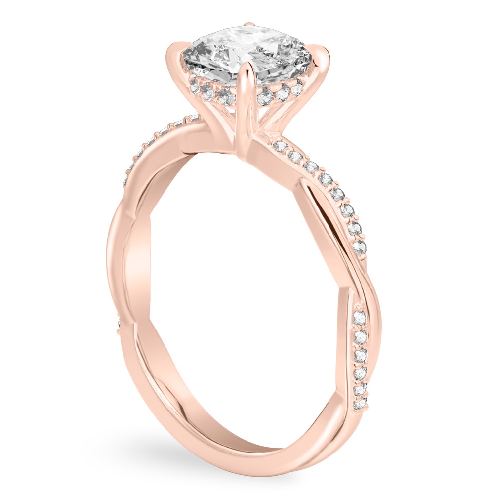 Angle view of cushion cut diamond twist hidden halo engagement ring in rose gold