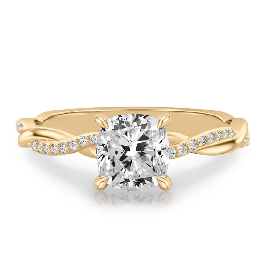 cushion cut diamond twist hidden halo engagement ring in yellow gold