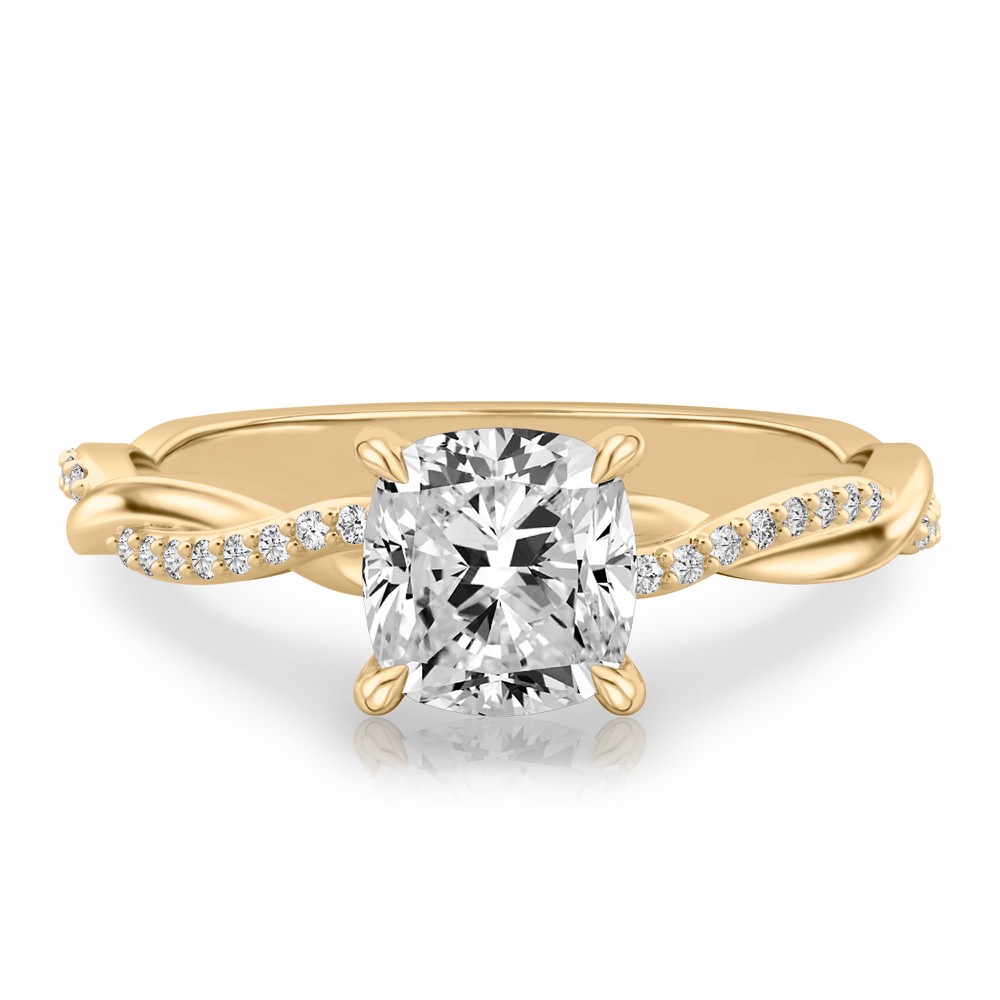 cushion cut diamond twist hidden halo engagement ring in yellow gold