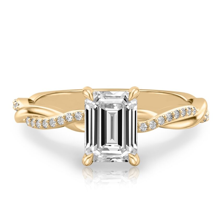 emerald cut diamond twist hidden halo engagement ring in yellow gold