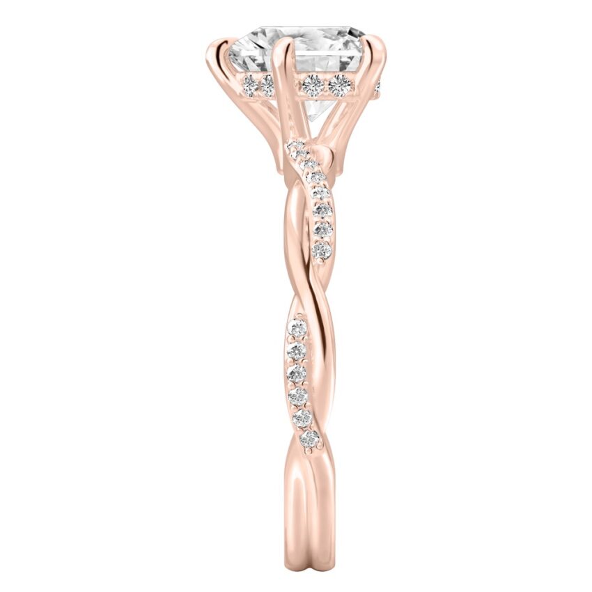 Side view of heart shape diamond twist hidden halo engagement ring in rose gold