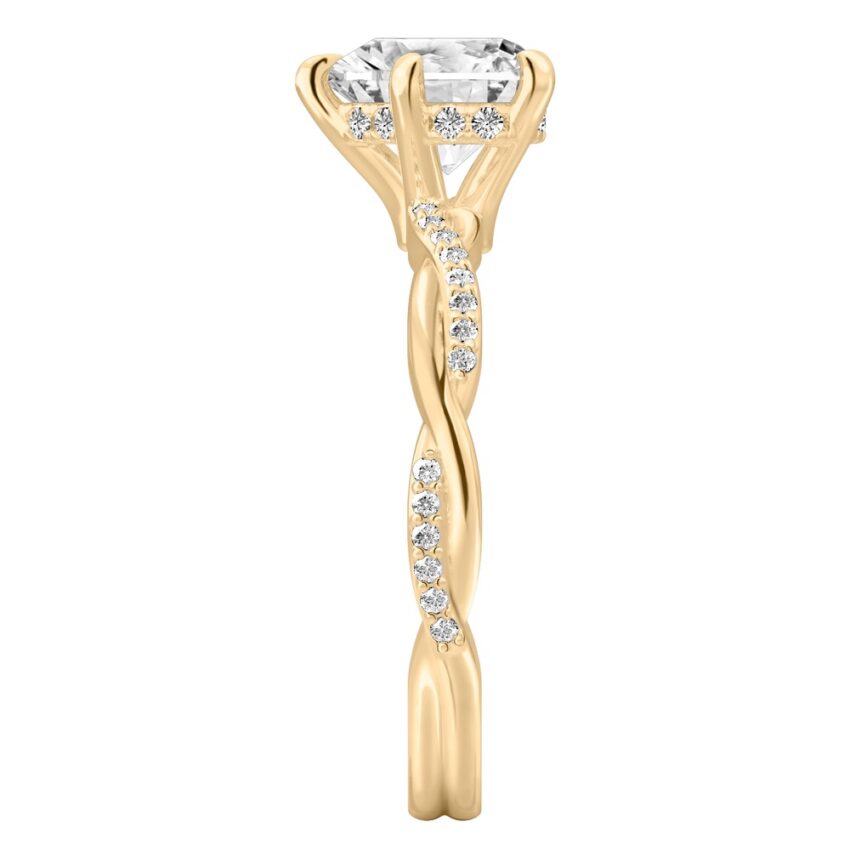 Side view of heart shape diamond twist hidden halo engagement ring in yellow gold