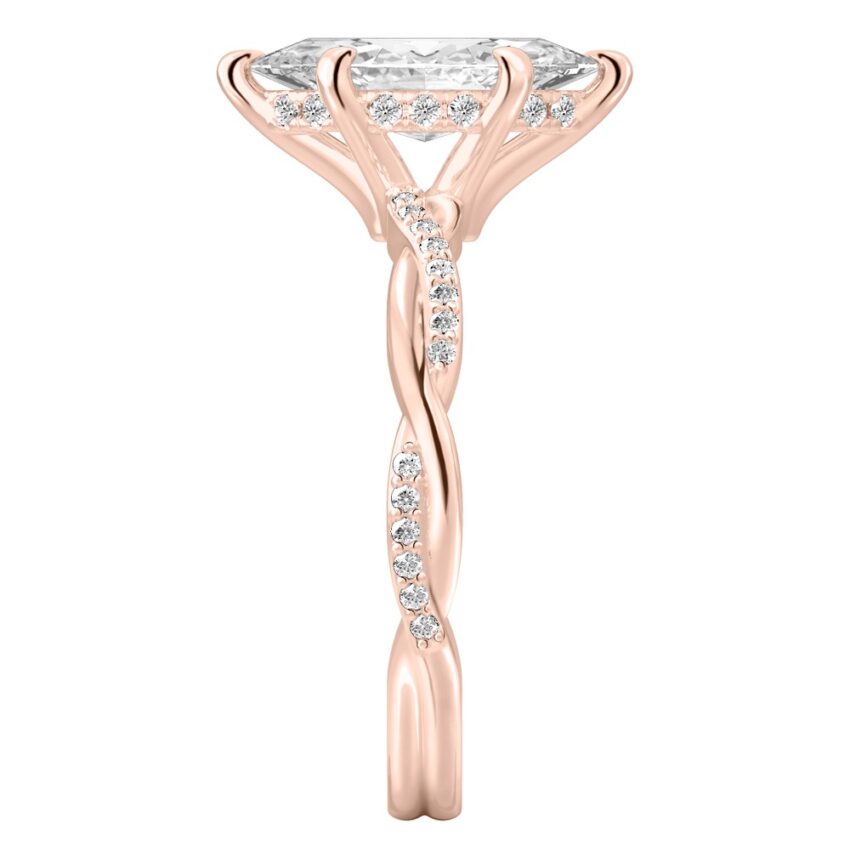 Side view of marquise cut diamond twist hidden halo engagement ring in rose gold