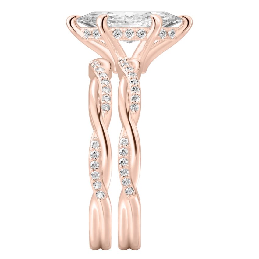Side view of marquise cut diamond twist hidden halo engagement ring set rose gold