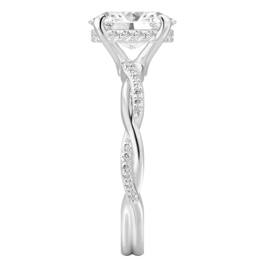 Side view of oval cut diamond twist hidden halo engagement ring in platinum