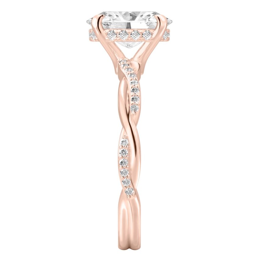 Side view of oval cut diamond twist hidden halo engagement ring in rose gold