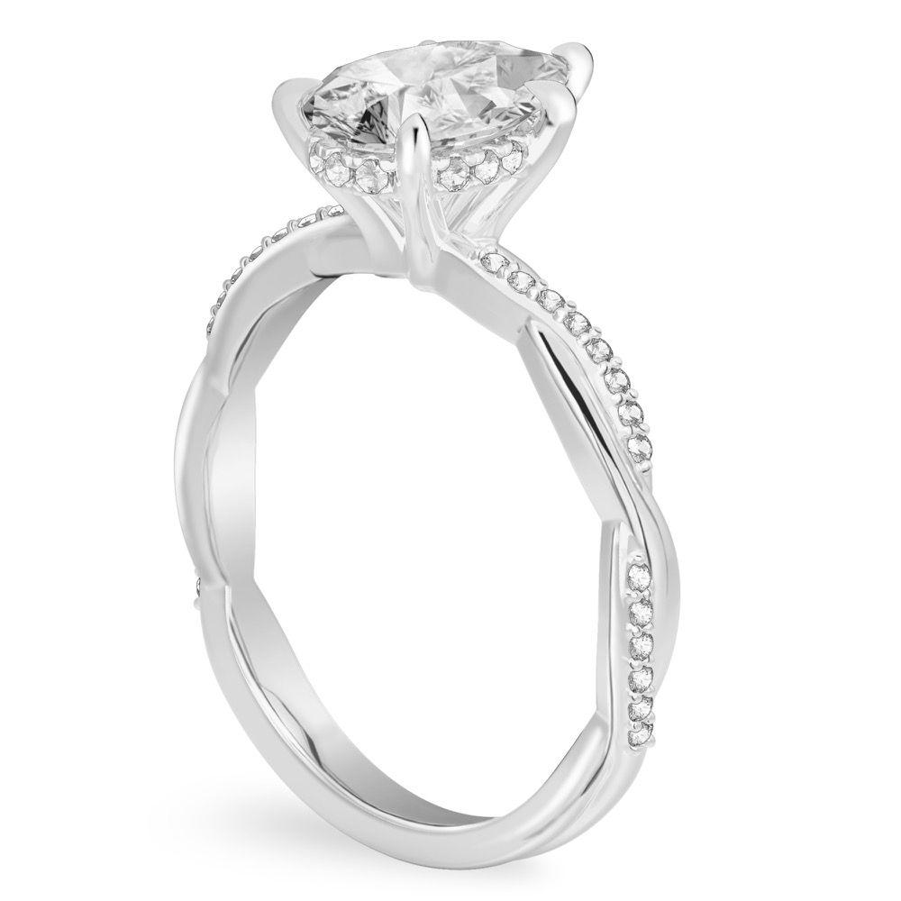 Angle view of pear shape diamond twist hidden halo engagement ring in white gold
