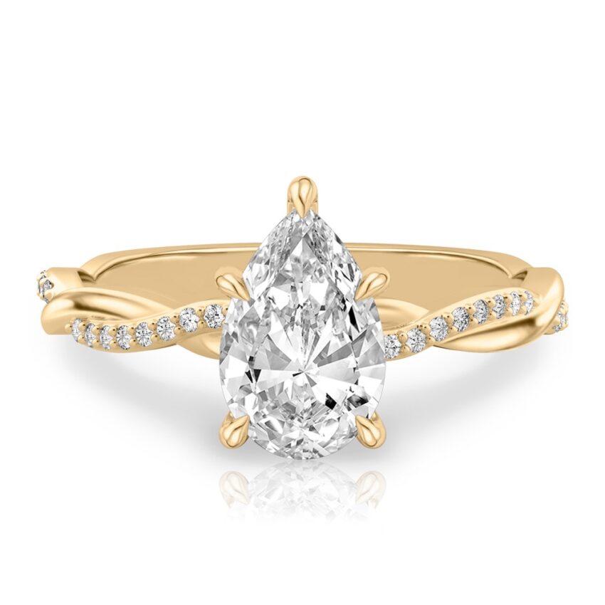 pear shape diamond twist hidden halo engagement ring in yellow gold