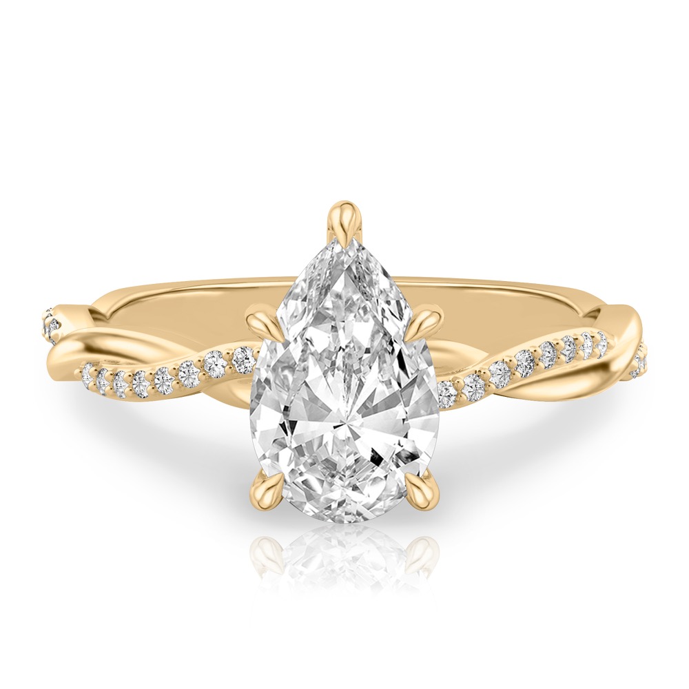 pear shape diamond twist hidden halo engagement ring in yellow gold