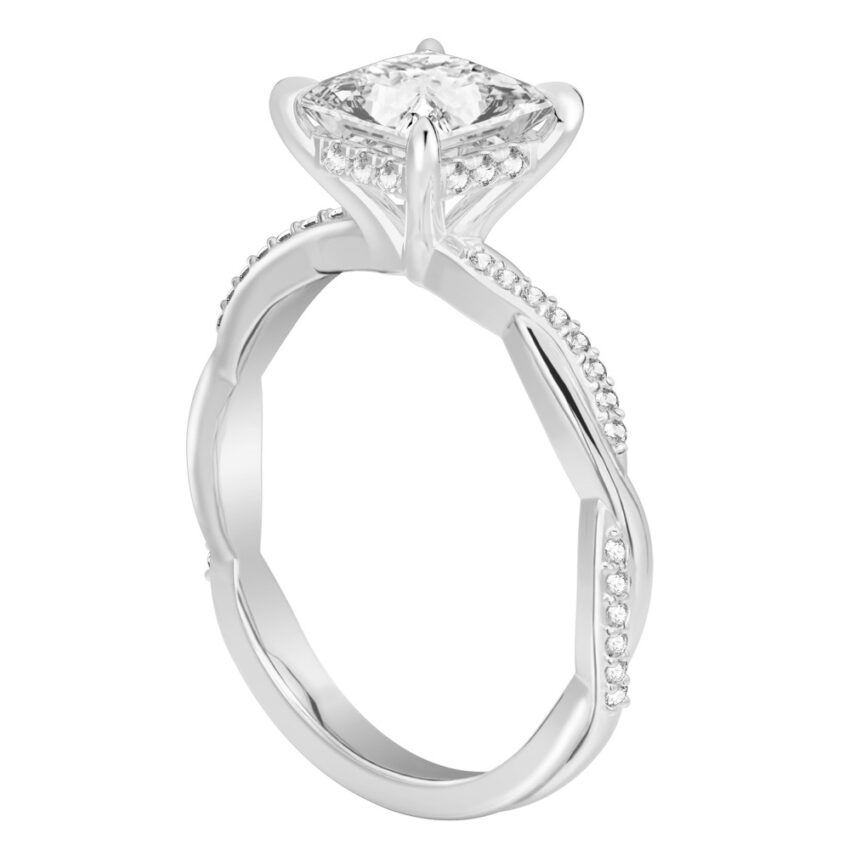 Angle view of princess cut diamond twist hidden halo engagement ring in platinum