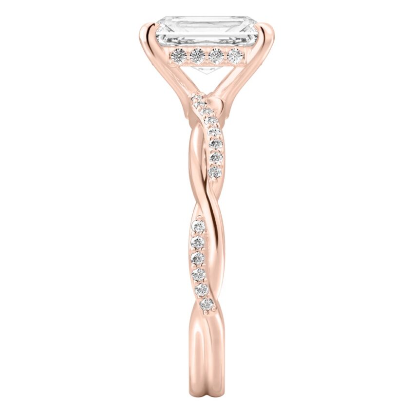 Side view of radiant cut diamond twist hidden halo engagement ring in rose gold