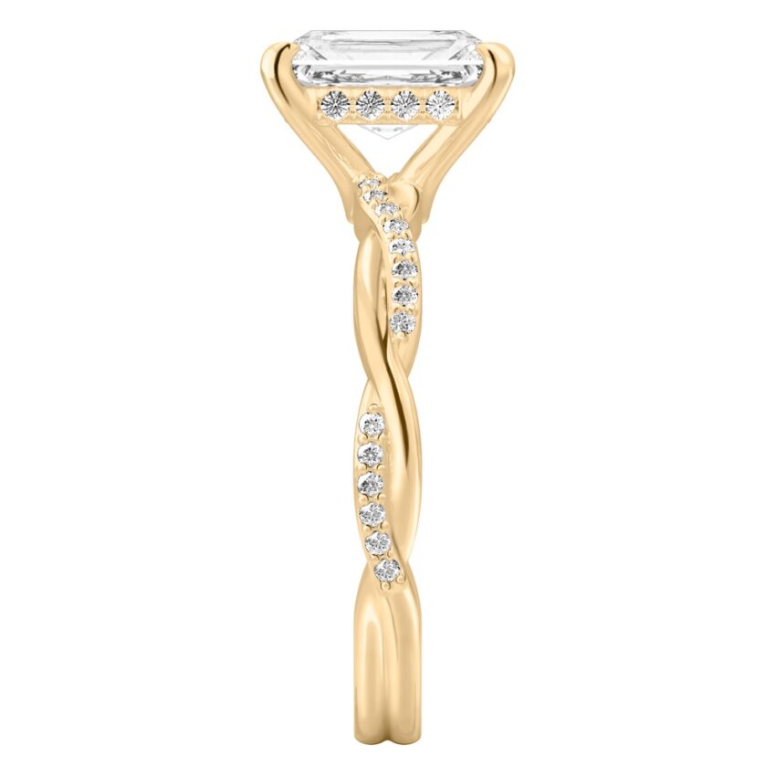 Side view of radiant cut diamond twist hidden halo engagement ring in yellow gold