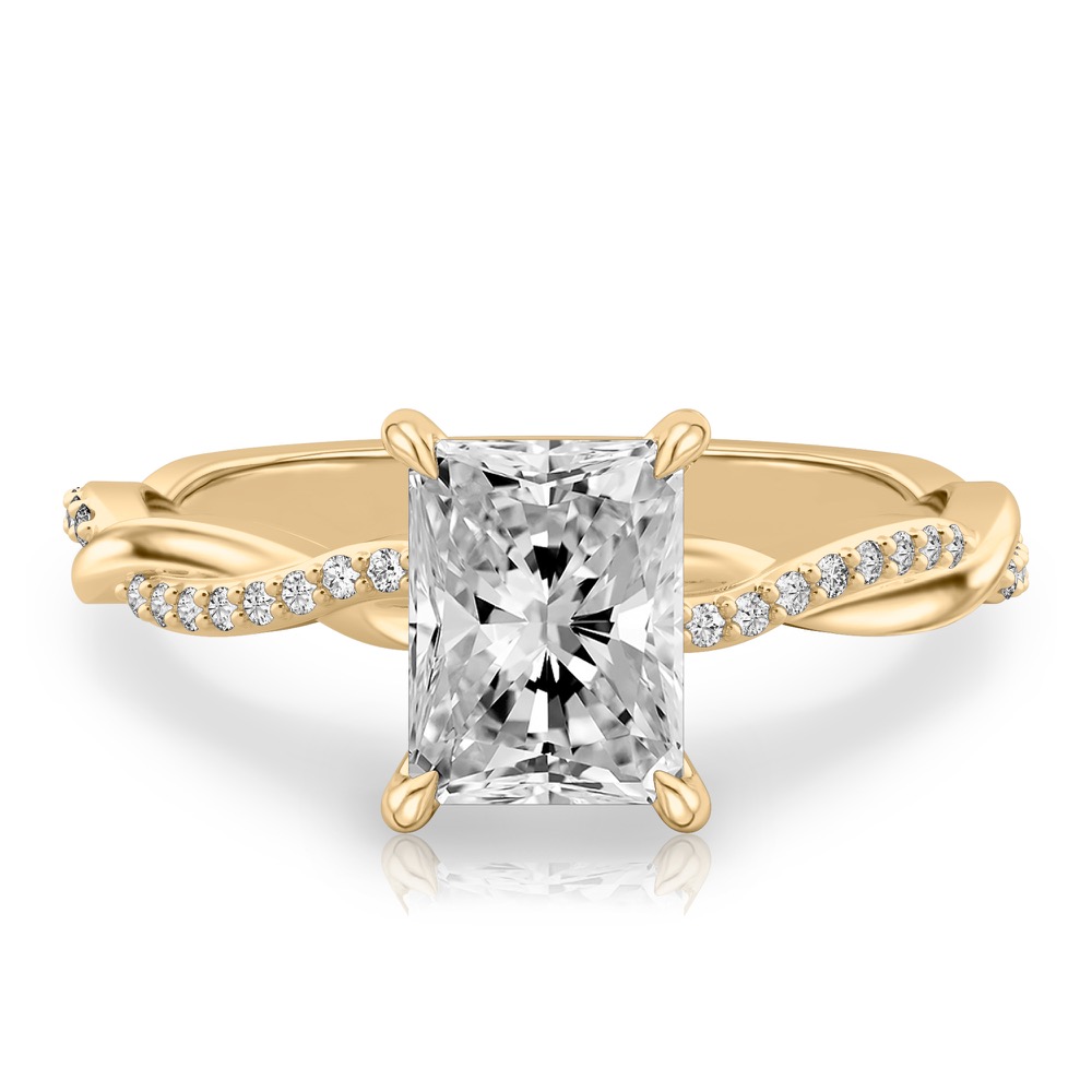 radiant cut diamond twist hidden halo engagement ring in yellow gold