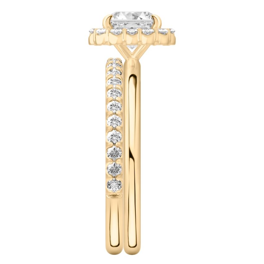 Side view of asscher cut diamond floral halo engagement ring set yellow gold