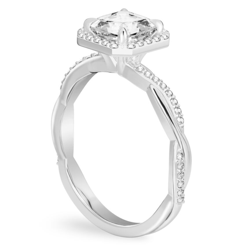 Angle view of asscher cut diamond twist halo engagement ring in white gold