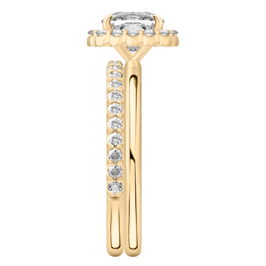 Side view of cushion cut diamond floral halo engagement ring set yellow gold