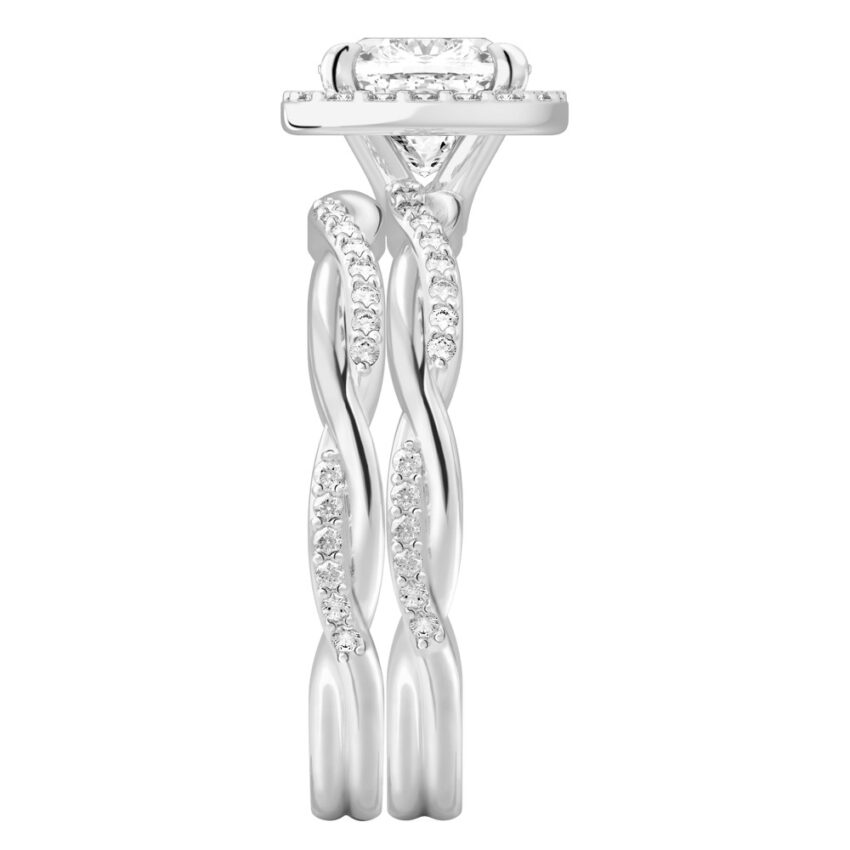 Side view of cushion cut diamond twist halo engagement ring set platinum