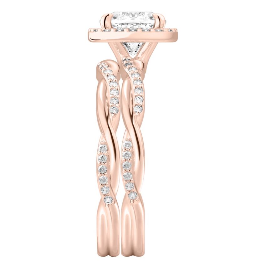 Side view of cushion cut diamond twist halo engagement ring set rose gold