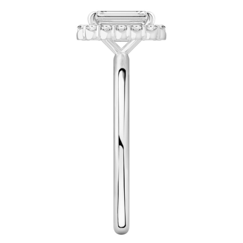 Side view of emerald cut diamond floral halo engagement ring in white gold
