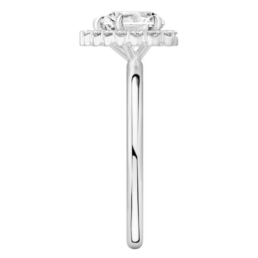 Side view of heart shape diamond floral halo engagement ring in palladium