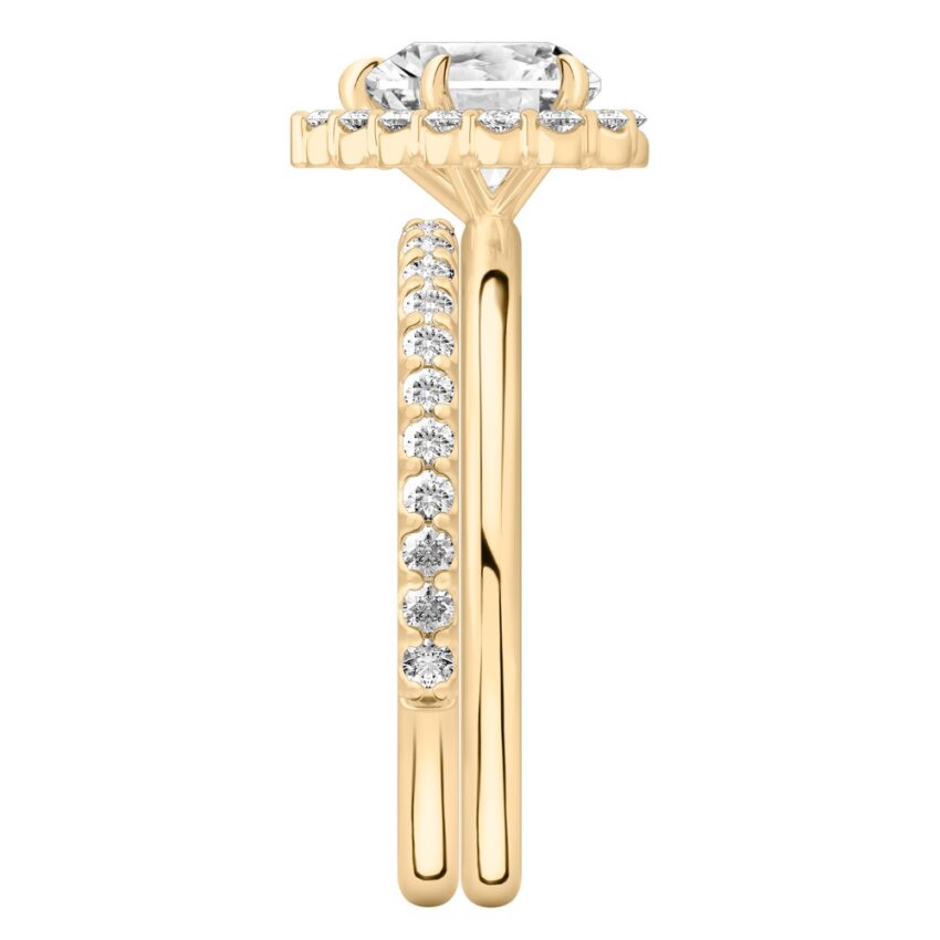 Side view of heart shape diamond floral halo engagement ring set yellow gold