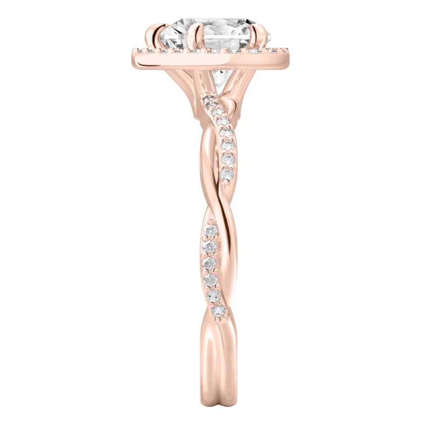 Side view of heart shape diamond twist halo engagement ring in rose gold