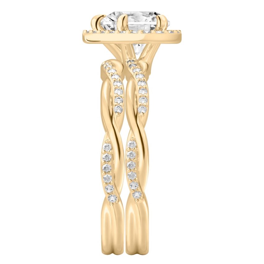 Side view of heart shape diamond twist halo engagement ring set yellow gold