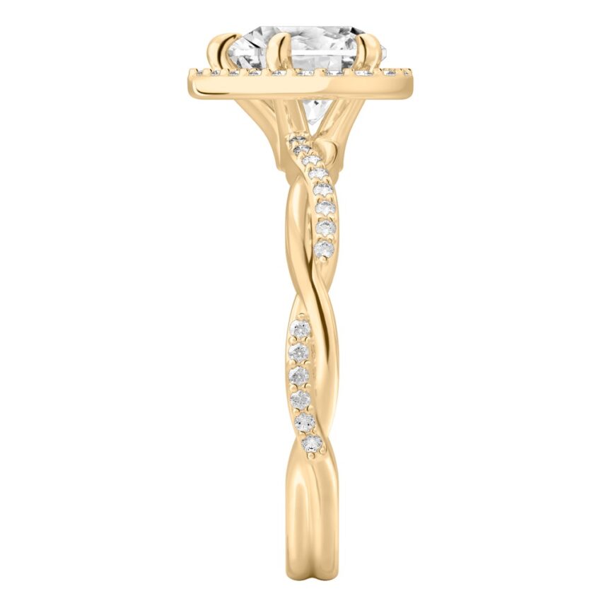 Side view of heart shape diamond twist halo engagement ring in yellow gold