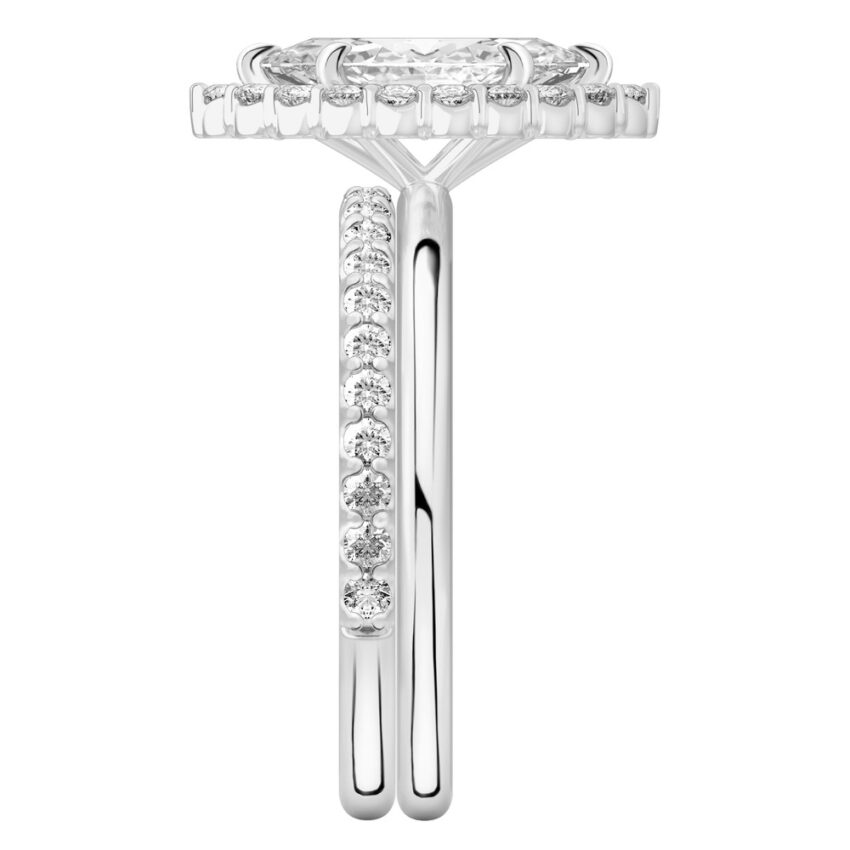 Side view of marquise cut diamond floral halo engagement ring set platinum