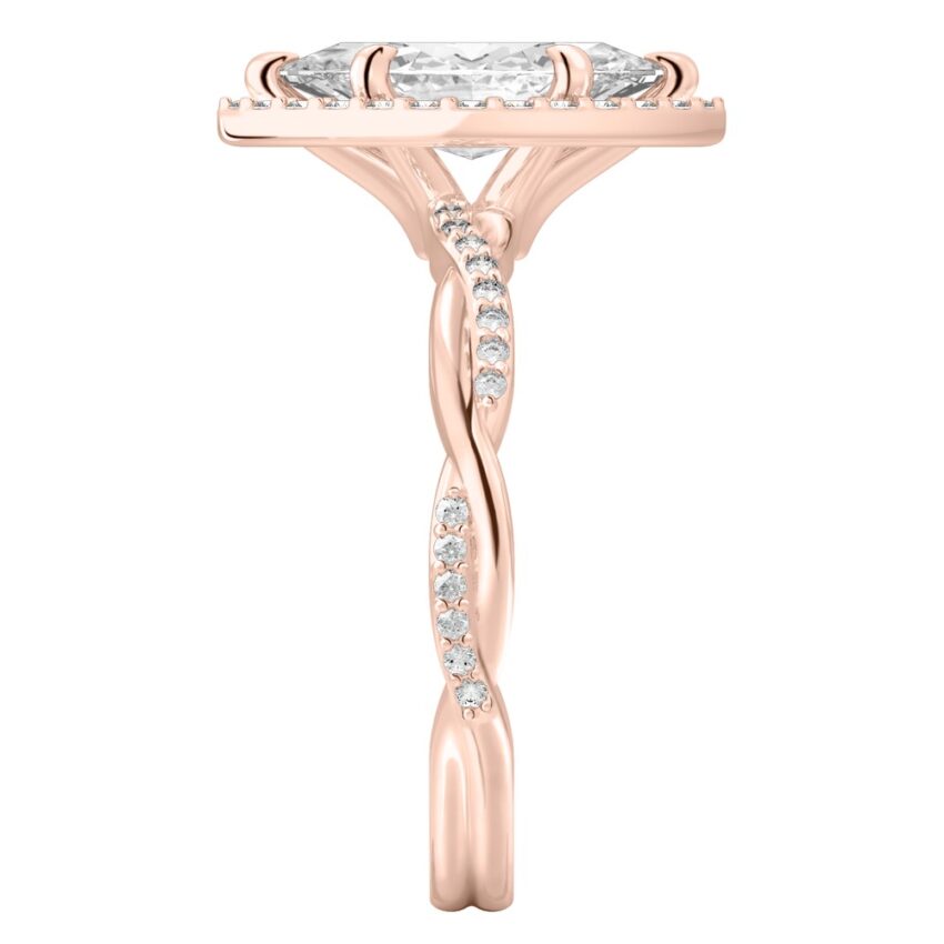 Side view of marquise cut diamond twist halo engagement ring in rose gold