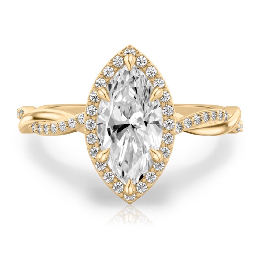 marquise cut diamond twist halo engagement ring in yellow gold