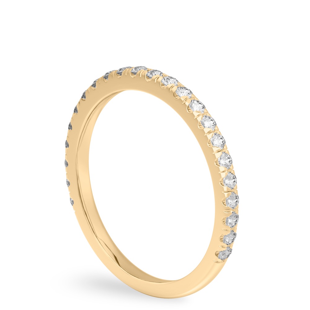 Angle view of micro pave wedding band in yellow gold