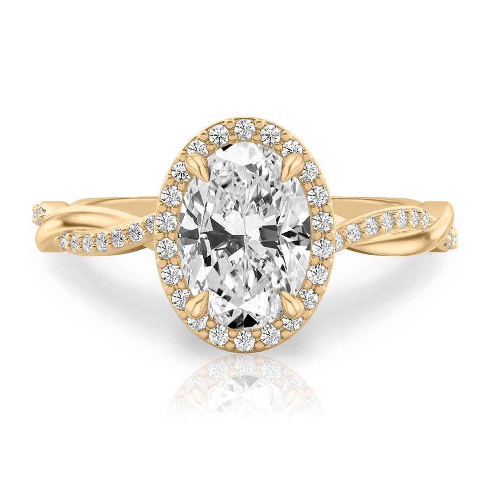 oval cut diamond twist halo engagement ring in yellow gold