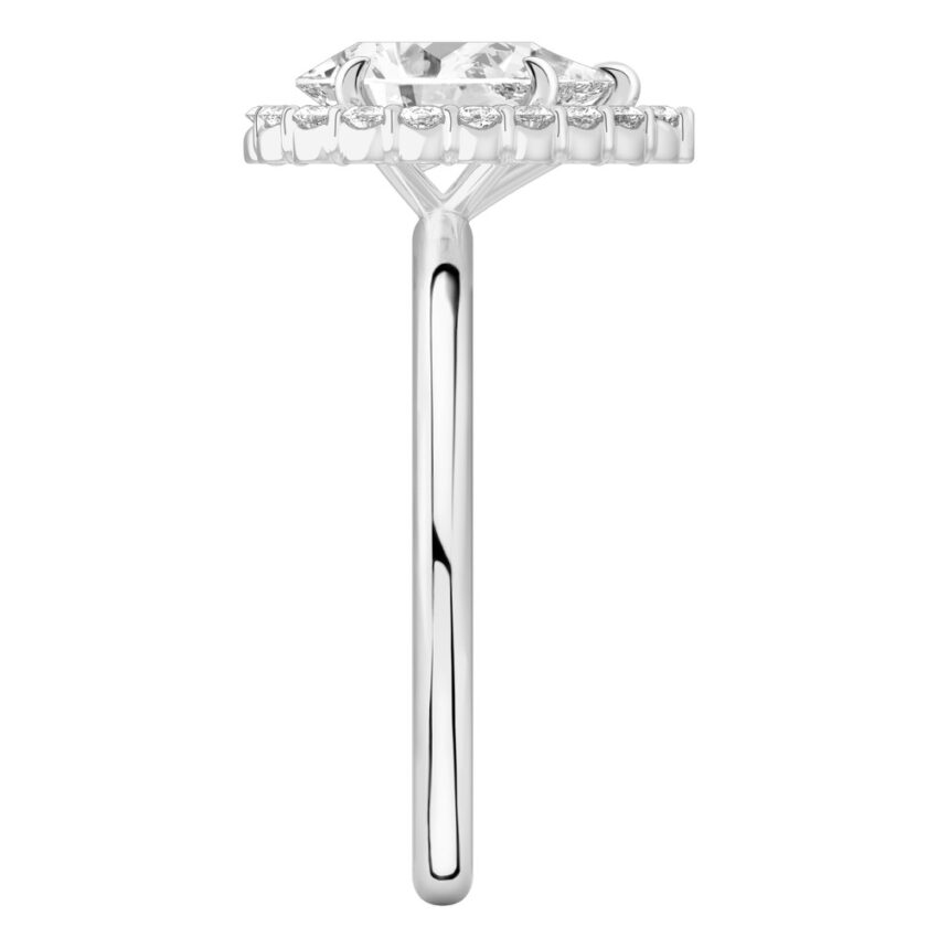 Side view of pear shape diamond floral halo engagement ring in white gold