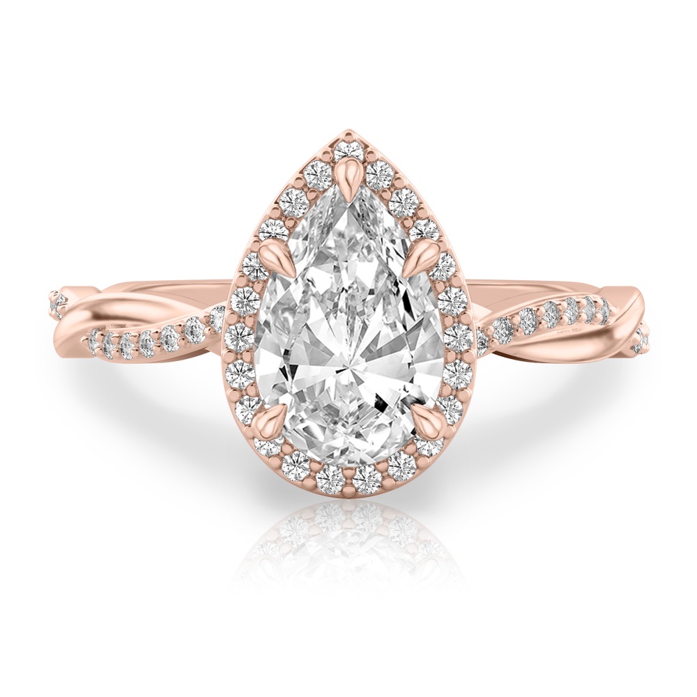 pear shape diamond twist halo engagement ring in rose gold