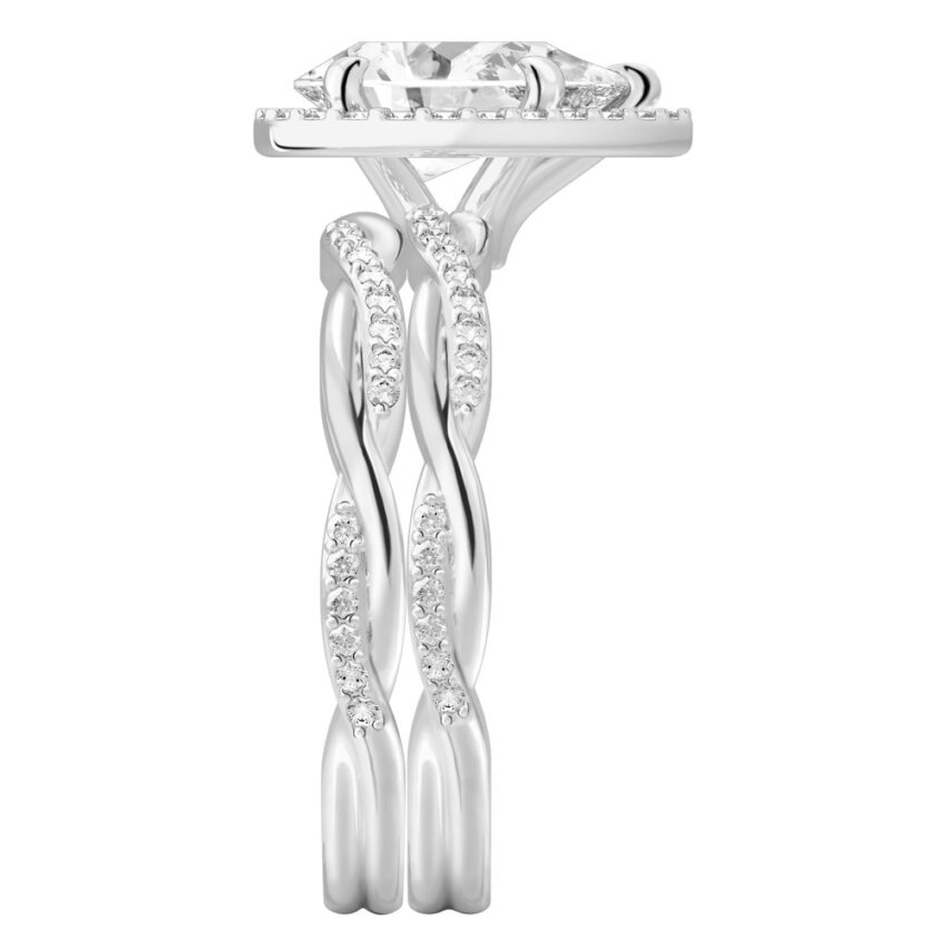 Side view of pear shape diamond twist halo engagement ring set white gold