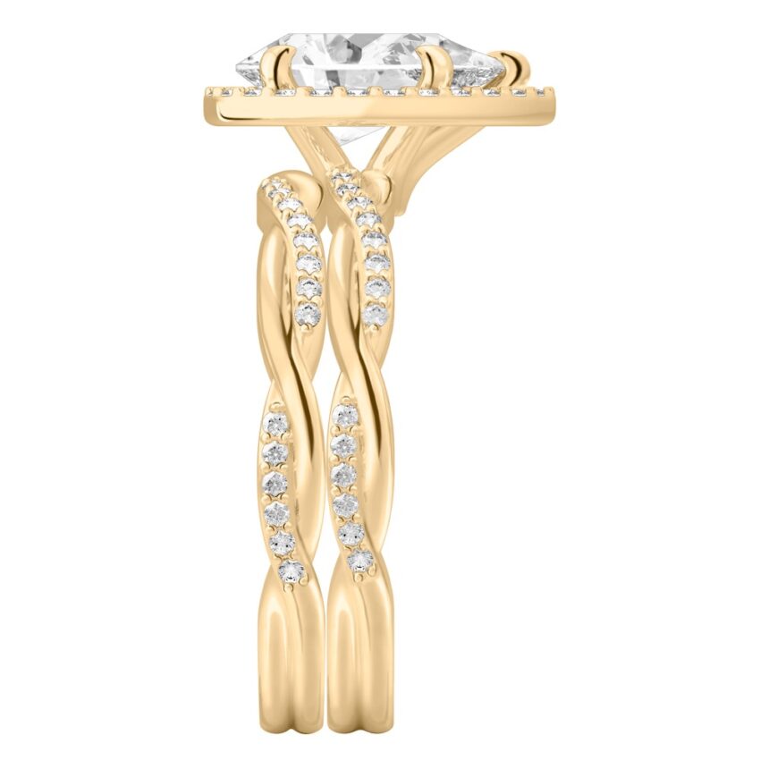 Side view of pear shape diamond twist halo engagement ring set yellow gold
