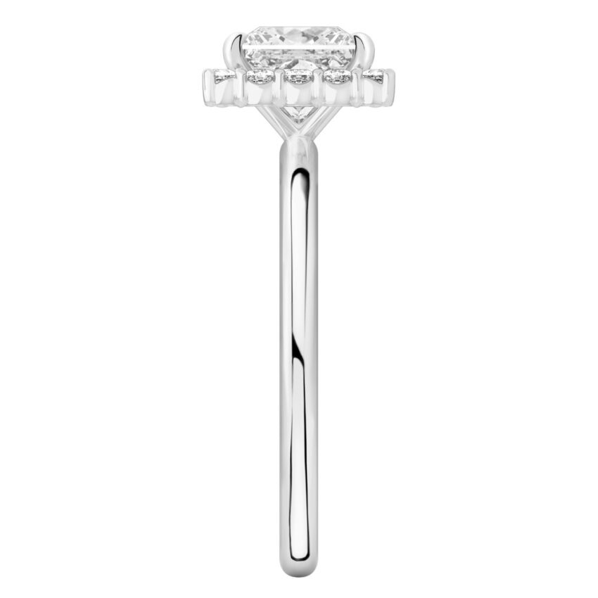Side view of princess cut diamond floral halo engagement ring in palladium